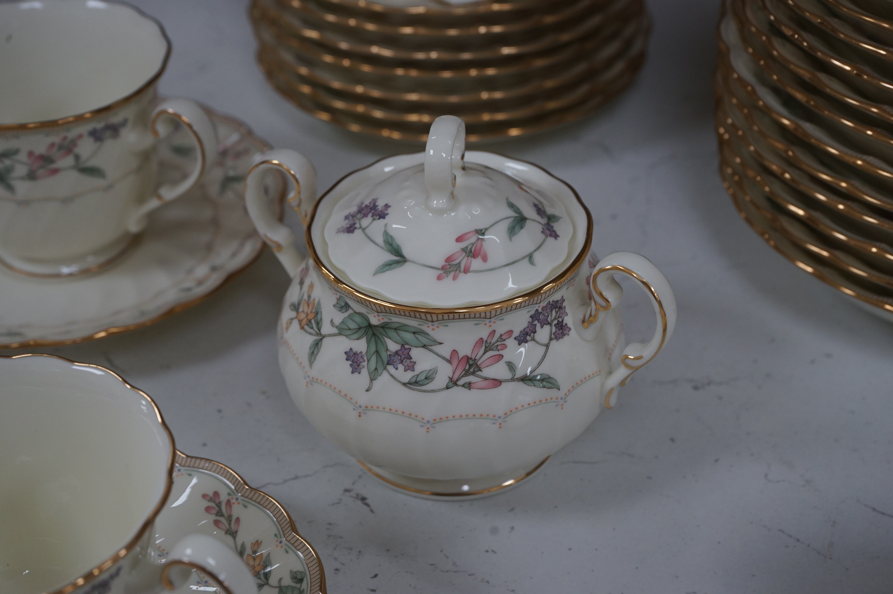 An extensive Noritake ‘ Brookhollow’ floral and gilt decorated dinner and tea service. Condition - good